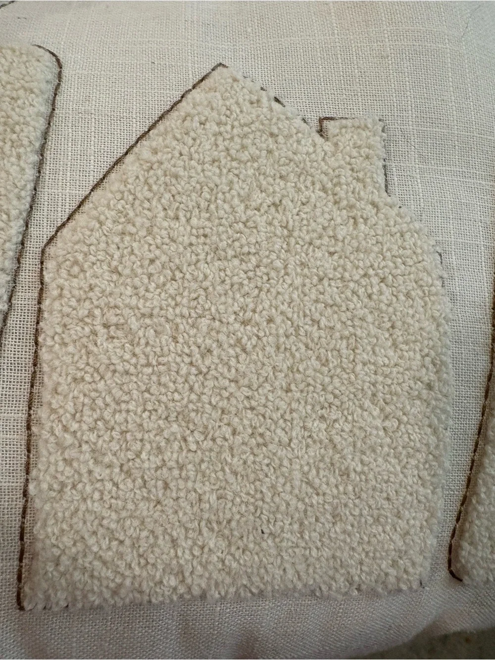 Accent pillow monochromatic cream color. Raised Home embroidery. Neutral
